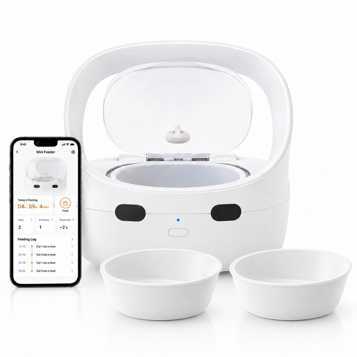 A white automatic pet feeder with an open lid, two small white bowls in front, and a smartphone app screen shown on the left against a clean white background.